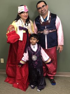 A mother, father and child wear the hanbok, a formal outfit traditionally worn on Lunar New Year and at weddings. 