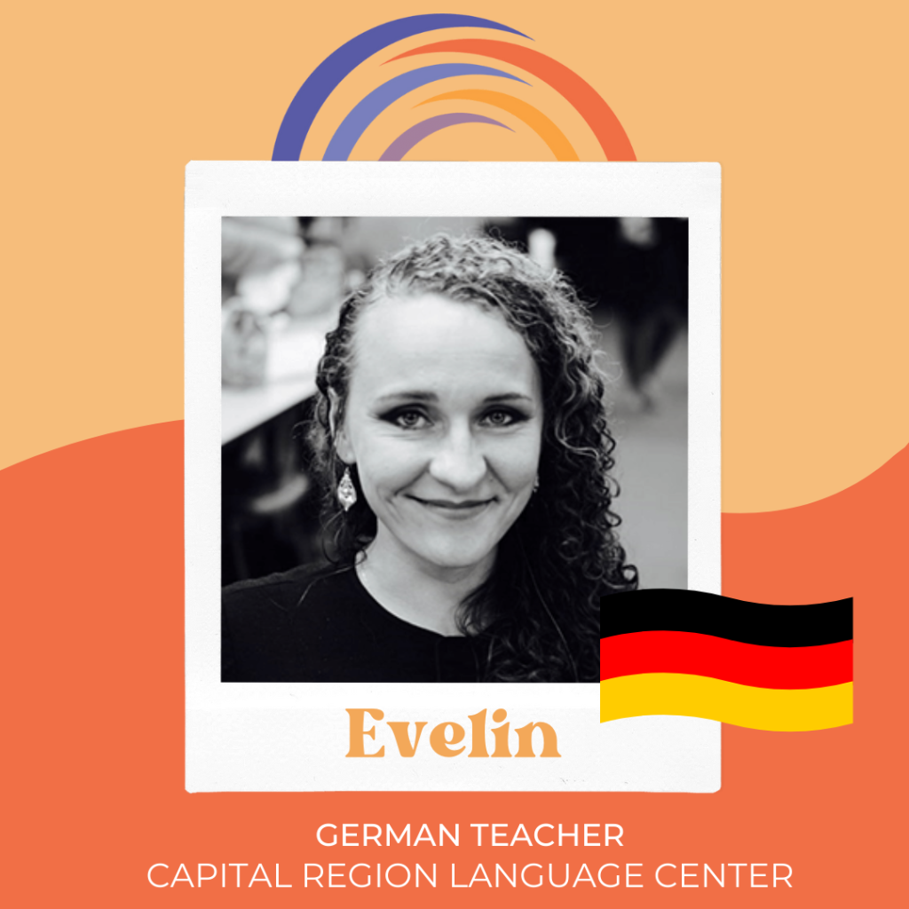 Photo of Evelin Bomer, German Language Teacher at Capital Region Language Center, with German flag.