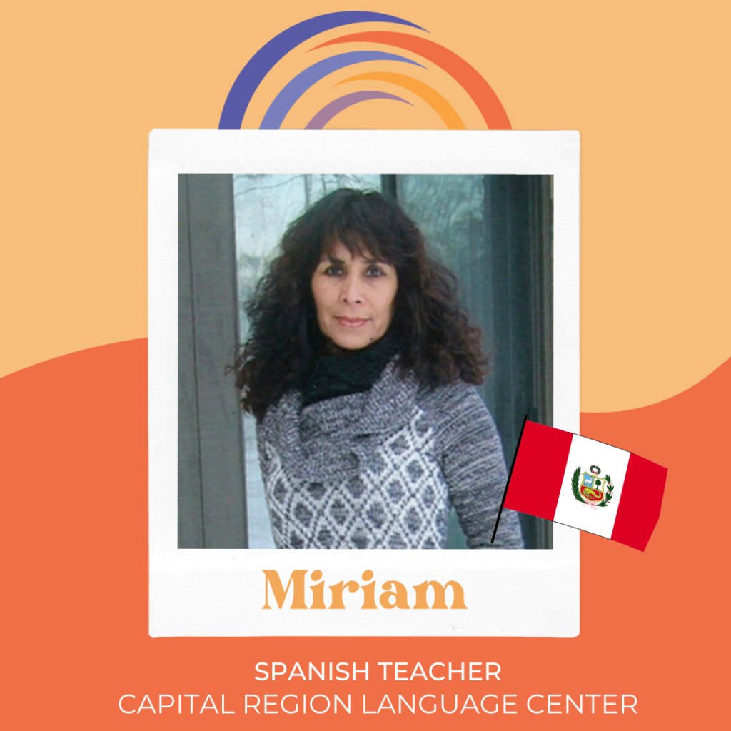 Miriam Rogers, Spanish language teacher at Capital Region Language Center, with Peruvian flag.