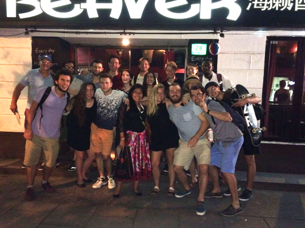Group of college students outside a Shanghai bar called Beaver. 