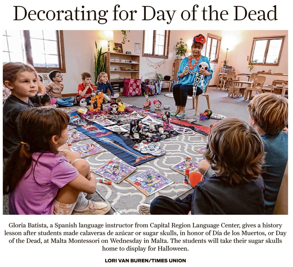 Students learn a song for Dia de los Muertos, or Day of the Dead, as part of their Spanish language class, provided by Capital Region Language Center, at Malta Montessori.