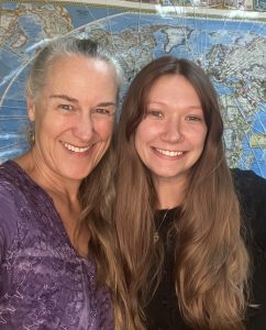 Two women, smiling into the camera.